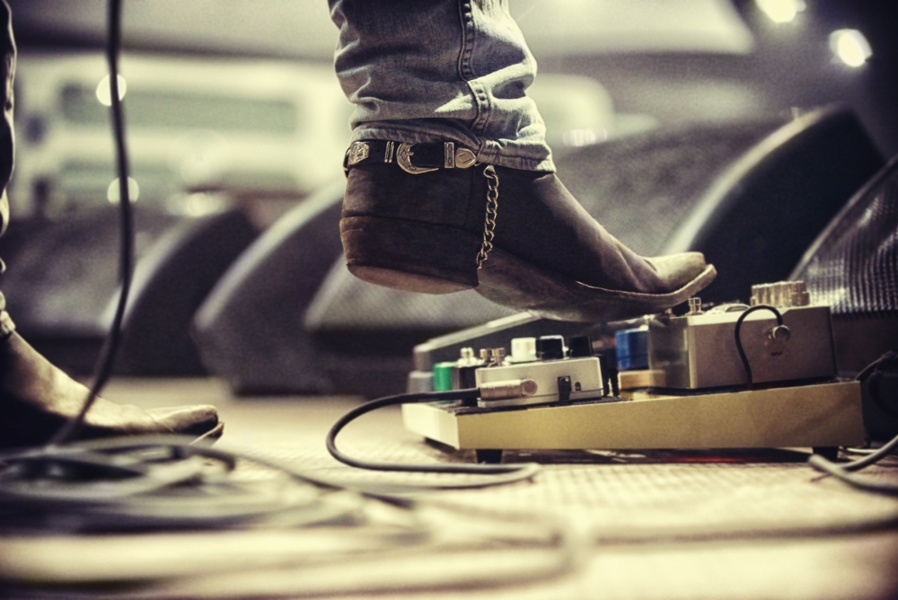 Controlling,The,Music.,Cropped,Shot,Of,A,Music,Artists,Foot